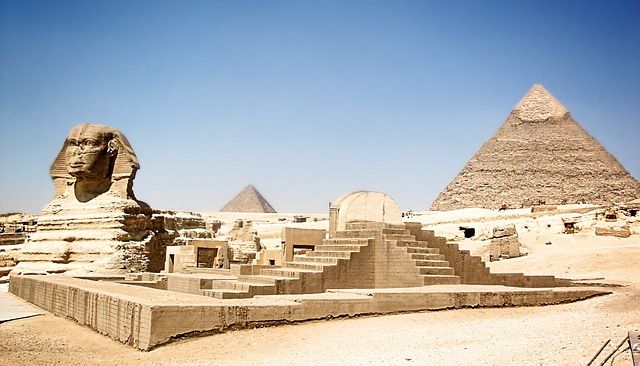 The Sphinx in front of a pyramid