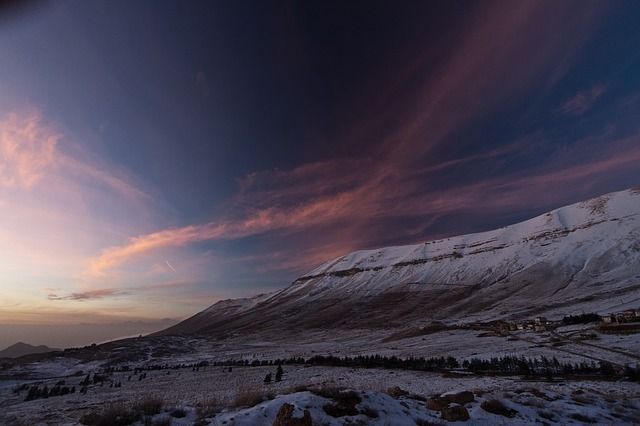 Snowy peaks at dusk