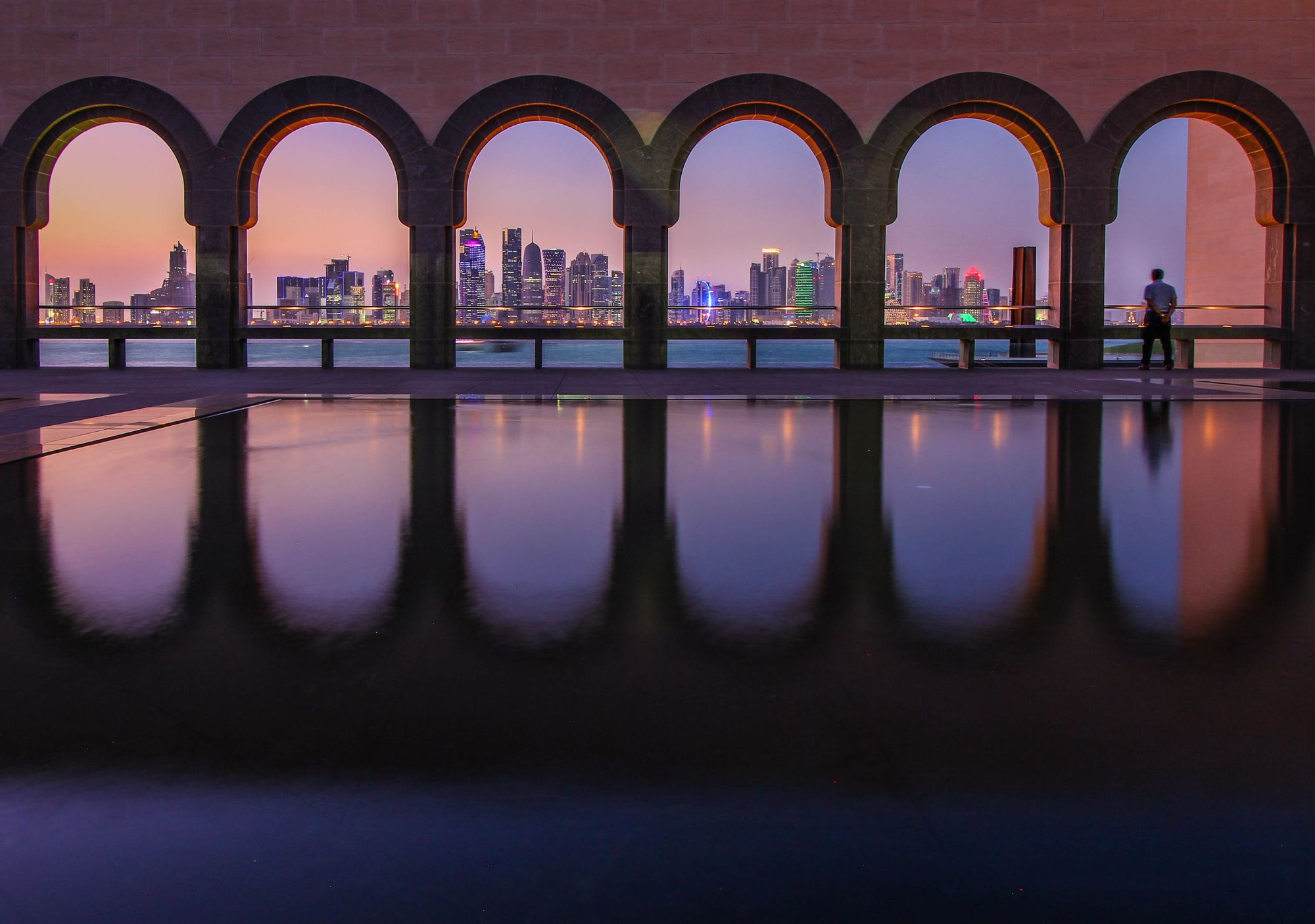 Arches opening onto Doha Bay